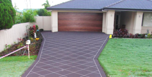 Patterned driveway with concrete sealer