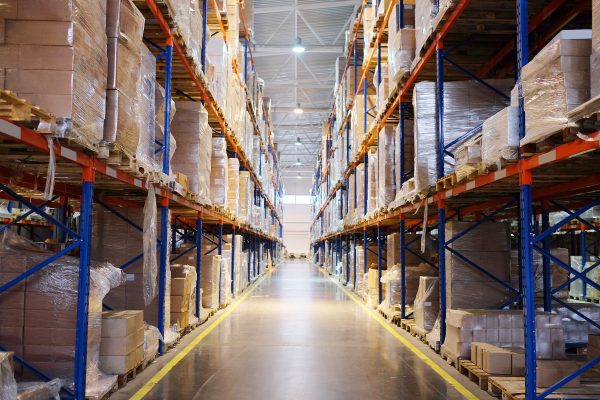 The image of shelves in the warehouse